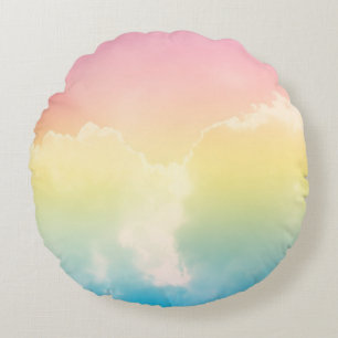 cloud background with a pastel colored gradient. b round cushion
