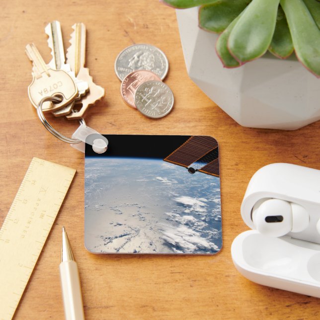 Cloud Formations Surrounding Sunglint Off Pacific Key Ring (Desk)