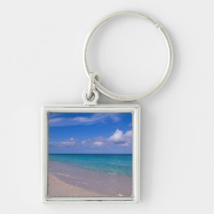 Cloud in blue sky over sandy beach key ring