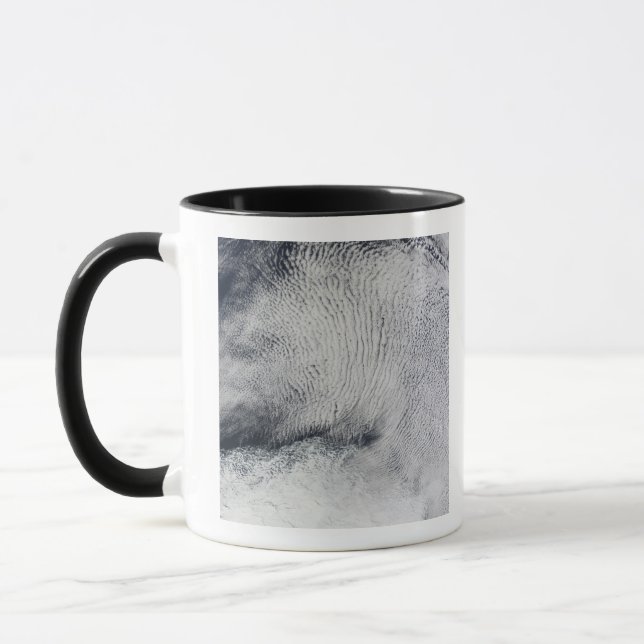 Cloud patterns and sea ice in the Southern Ocea Mug (Left)