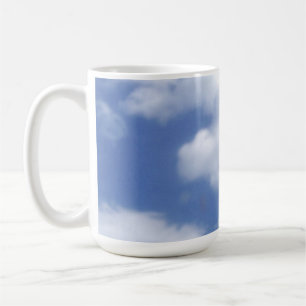 clouds in blue sky coffee mug