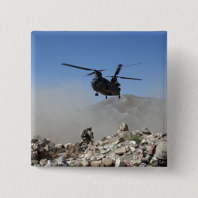 Clouds of dust kicked up by the rotor wash 15 cm square badge (Front)