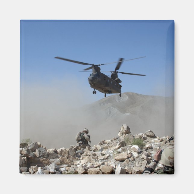 Clouds of dust kicked up by the rotor wash magnet (Front)