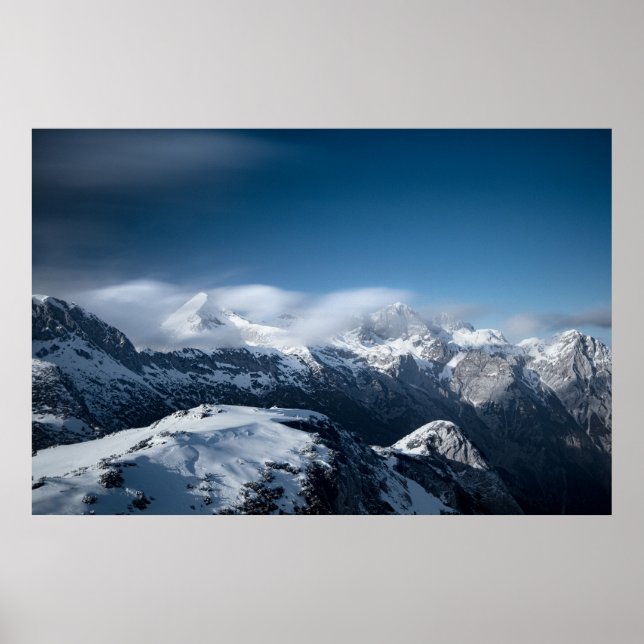 Clouds rolling above snowy mountains poster (Front)