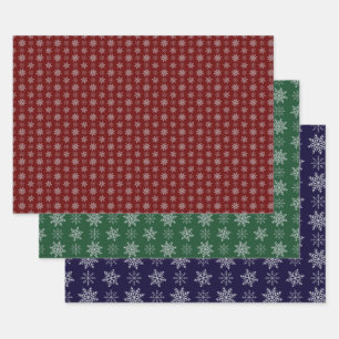 Cluster of Snowflakes on Deep Red, Green and Blue Wrapping Paper Sheet