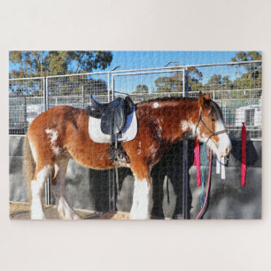 Clydesdale horse relaxing near the stables jigsaw puzzle