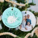 Coastal Beach Christmas Starfish Family Photo Ceramic Tree Decoration<br><div class="desc">This personalised aqua blue coastal beach themed ornament, features a glitter coral piece with sand dollar and starfish, with family name and year on the front, and a photo on the back. *If you would like this design on more products or need design help, please contact me through Zazzle Chat....</div>