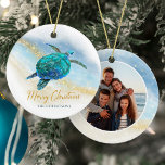 Coastal Beach Sea Turtle Merry Christmas Photo Ceramic Tree Decoration<br><div class="desc">This coastal themed holiday ornament is easily personalised with family name on the front and a photo on the back, and features a watercolor turquoise blue sea turtle on an abstract beach background with a faux gold glitter sparkly wave, and gold Merry Christmas. Check out the collection for more matching...</div>