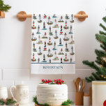 Coastal Christmas Lighthouses Tea Towel<br><div class="desc">This personalised nautical Christmas kitchen towel features a variety of lighthouses decorated for the holidays,  on a white background,  with the name at the bottom. Please check out the collection for matching products. If you would like more matching products or other colorways,  please contact me through Zazzle Chat.</div>