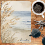 Coastal Sea Oats Monogram iPad Air Cover<br><div class="desc">Escape to the tranquil shores with our exclusive customisable iPad cover featuring a breathtaking watercolor graphic of a serene beach scene adorned with swaying sea oats. It gives a whole new meaning to surfing the internet!</div>