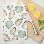 Coastal Watercolor Oyster & Pearl Tea Towel<br><div class="desc">This coastal chic kitchen towel features soft cream and aqua watercolor oyster and pearl illustrations. Perfect for beach houses,  coastal abodes,  or anyone who loves oysters and fresh shellfish.</div>