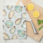 Coastal Watercolor Oyster & Pearl Tea Towel<br><div class="desc">This coastal chic kitchen towel features soft cream and aqua watercolor oyster and pearl illustrations. Perfect for beach houses,  coastal abodes,  or anyone who loves oysters and fresh shellfish.</div>