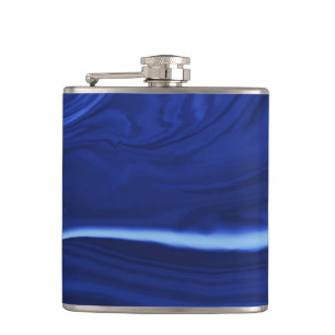 Cobalt blue background hip flask
