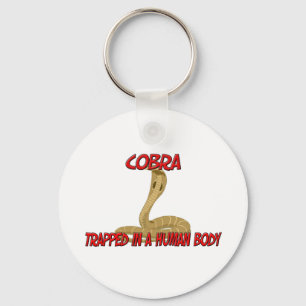 Cobra trapped in a human body key ring