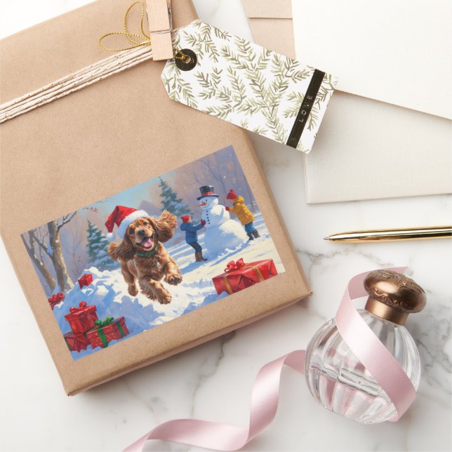 Cocker Spaniel Running in Snow with Christmas Hat Rectangular Sticker (Gifting)