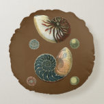 Cocoa Shell Round Cushion<br><div class="desc">Get this unique stonewashed red and blue Conch seashell image on your next product. This amazing,  cocoa background these two unique seashells. Take the beach with you everywhere you go.</div>