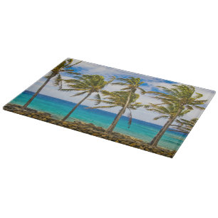 Coconut palm trees (Cocos nucifera) swaying in Cutting Board