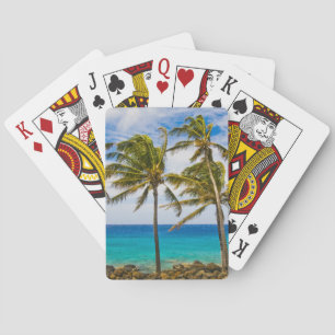 Coconut palm trees (Cocos nucifera) swaying in Playing Cards