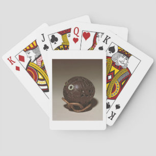 Coconut sculpted into a face, c.1895 playing cards