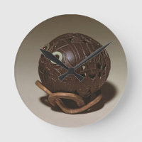 Coconut sculpted into a face, c.1895