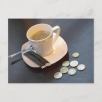 Coffee and money on a table