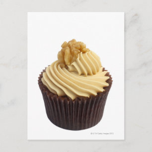 Coffee cupcake topped with coffee cream and a postcard