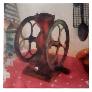 Coffee Grinder on Red Tablecloth Tile
