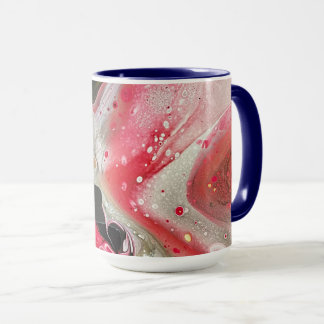 Coffee mug in pink, black, and gold colors