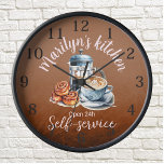 Coffee-themed Wall Clock<br><div class="desc">At the centre of the clock,  you'll find an intricately designed coffee pot,  coffee cup,  ready to kickstart your day,  and cinnamon rolls,  freshly baked to perfection.
To make this coffee-themed wall clock truly your own,  we offer the option to customise it with your name or a special message.</div>