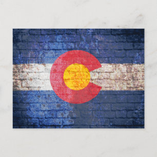 Colorado flag grunge brick wall postcard