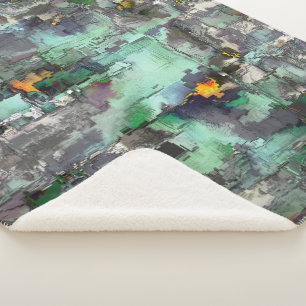 Coloration in rock, mint green to grey predominate sherpa blanket