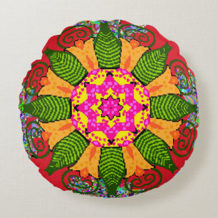 Colored round floral mandala on a red, green and cushion