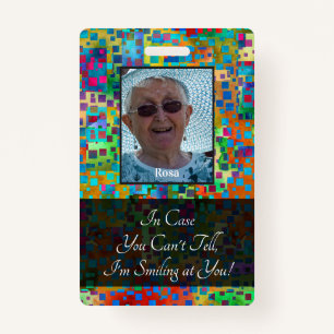 Colorful Abstract Graphic Smiling Behind a Mask ID Badge