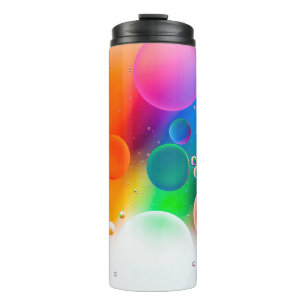 Colorful artistic image of oil drop on water, mode thermal tumbler