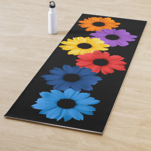 Colorful daisies on a black background yoga mat