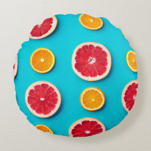 Colorful fruit pattern of fresh orange and grapefr round cushion