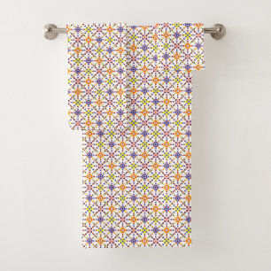 Colorful geometric-patterned towel and washcloth 