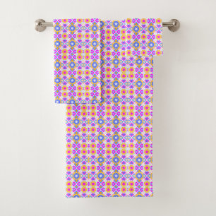 Colorful geometric-patterned towels on a rack