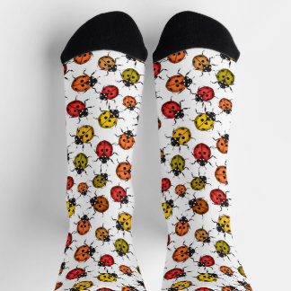 Colorful ladybugs on white socks