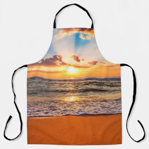 Colorful ocean beach sunrise with deep blue sky an apron