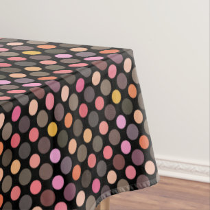 colorful polka dots on black tablecloth