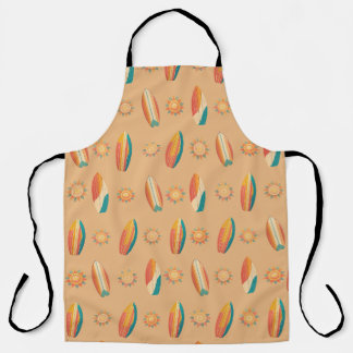 Colorful surfboards and suns against golden sand. apron