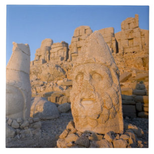 Colossal head statues of Gods guarding the Tile