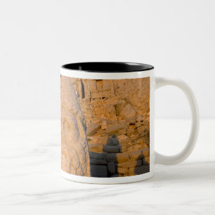 Colossal head statues of Gods guarding the Two-Tone Coffee Mug