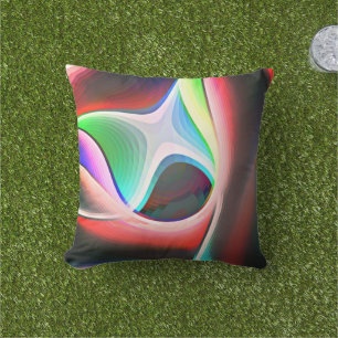 Coloured abstract shape of curved clippings overla cushion