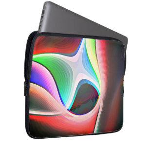 Coloured abstract shape of curved clippings overla laptop sleeve