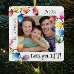 Coloured Christmas Lights Photo Christmas Ceramic Ornament<br><div class="desc">Send your holiday cheer this season with a personalised 'Lets Get Lit' Christmas ornament! Featuring a bright and bold display of lights surrounding your family photo, your name and year, this ornament is sure to make a lasting impression. Put the perfect finishing touch on your holiday with this unique and...</div>