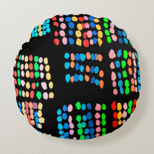Coloured dots round cushion