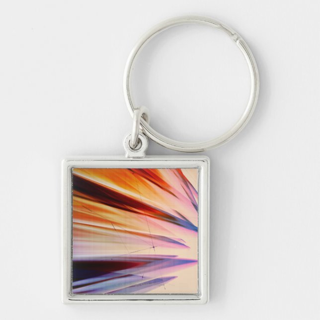 Colourful abstract objects against white key ring (Front)