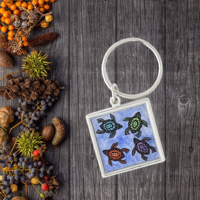 Colourful Abstract Turtles Key Ring (Four black abstract turtles with coloured shells on blue keychain.)
